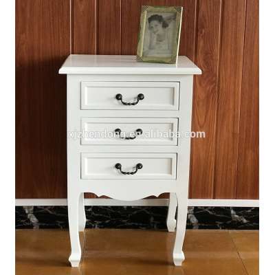 Lovely White wooden bedside table with three drawers